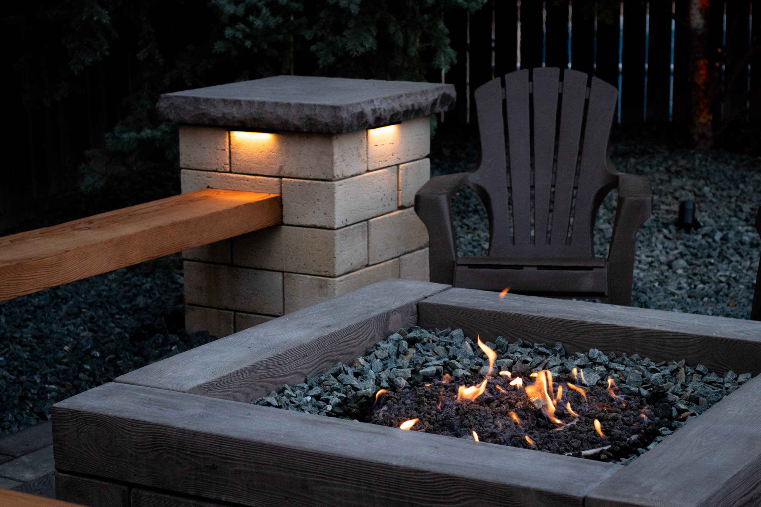 Best landscape contractor specializing in design/build in Bellevue | modern fire pit, column, bench, landscape lighting